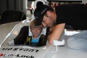 Young Chase, talking race strategy with Indylights driver James Hinchcliff